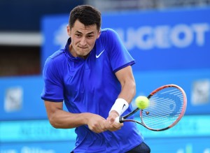 Bernard Tomic hits a backhand at the Aegon Championships at the Queen's Club in London/Getty Images
